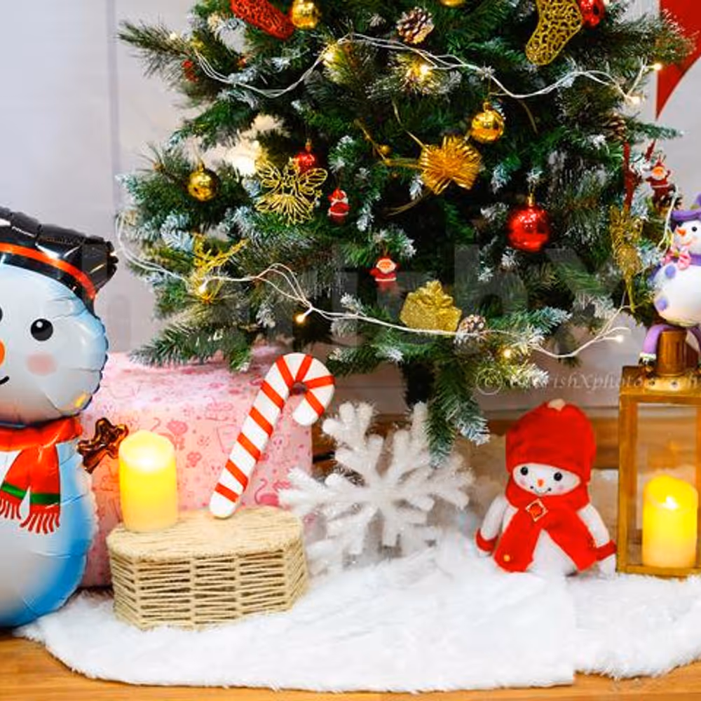 Premium Wreath, Assorted Ornaments, and festive Candy Canes in the Jingle Bell Entrance Decor.