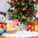 Premium Wreath, Assorted Ornaments, and festive Candy Canes in the Jingle Bell Entrance Decor.