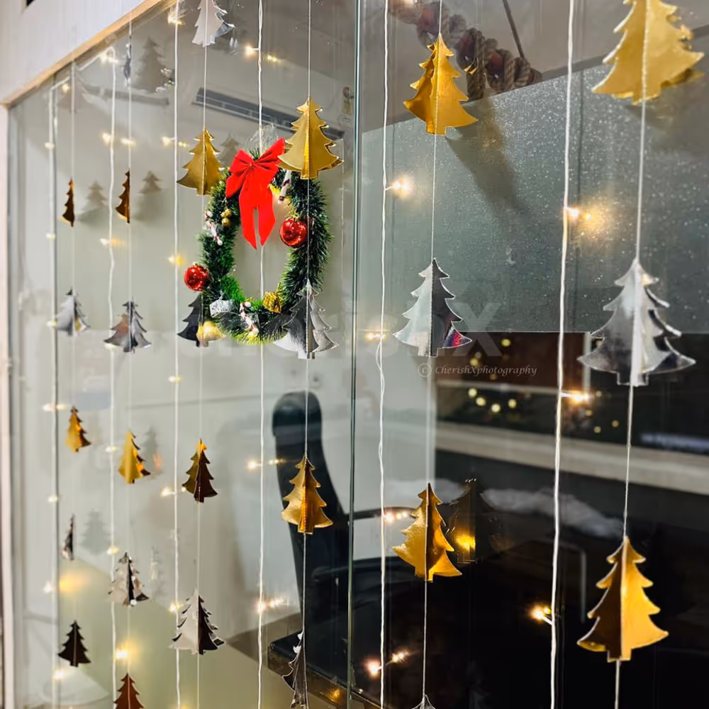 Beautiful gift boxes nestled beneath the Christmas tree add more magic to the decoration.