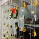 Beautiful gift boxes nestled beneath the Christmas tree add more magic to the decoration.