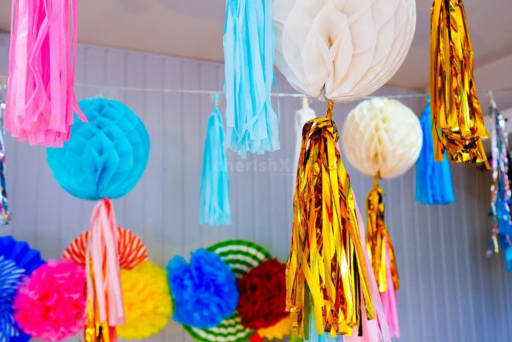 A selection of colourful paper lanterns as part of festive decorations.