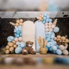 Every corner of this space invites you to click, smile, and revel in the magic of this subtly captivating blue and brown balloon theme.