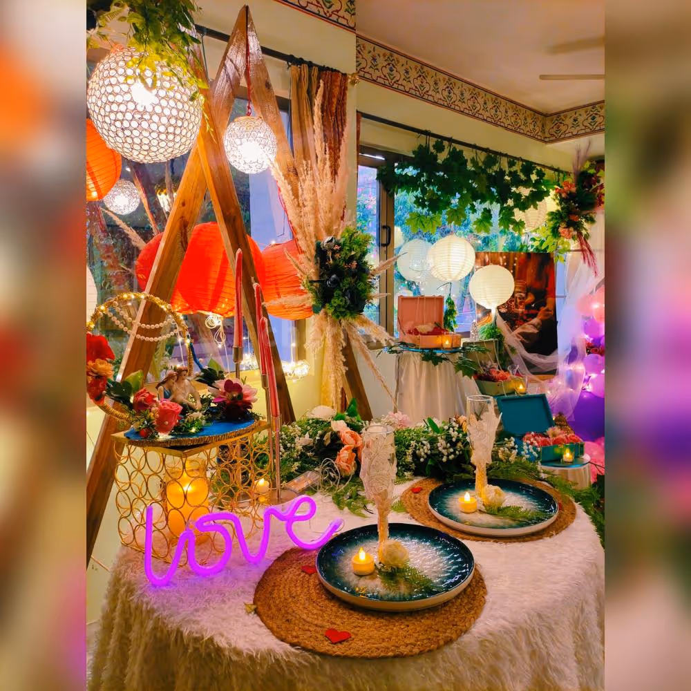 Elegant table setting adorned with sumptuous meals, creating a whimsical and romantic atmosphere at Love Garden, Jaipur.