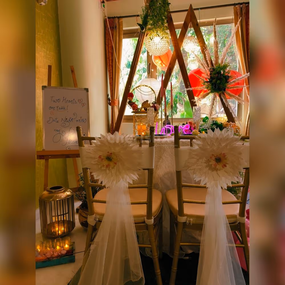 Captivating view of Love Garden's enchanting decor, featuring elegant table arrangements and a warm, intimate atmosphere.