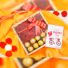 This Love hamper box has a clear box of fresh red roses