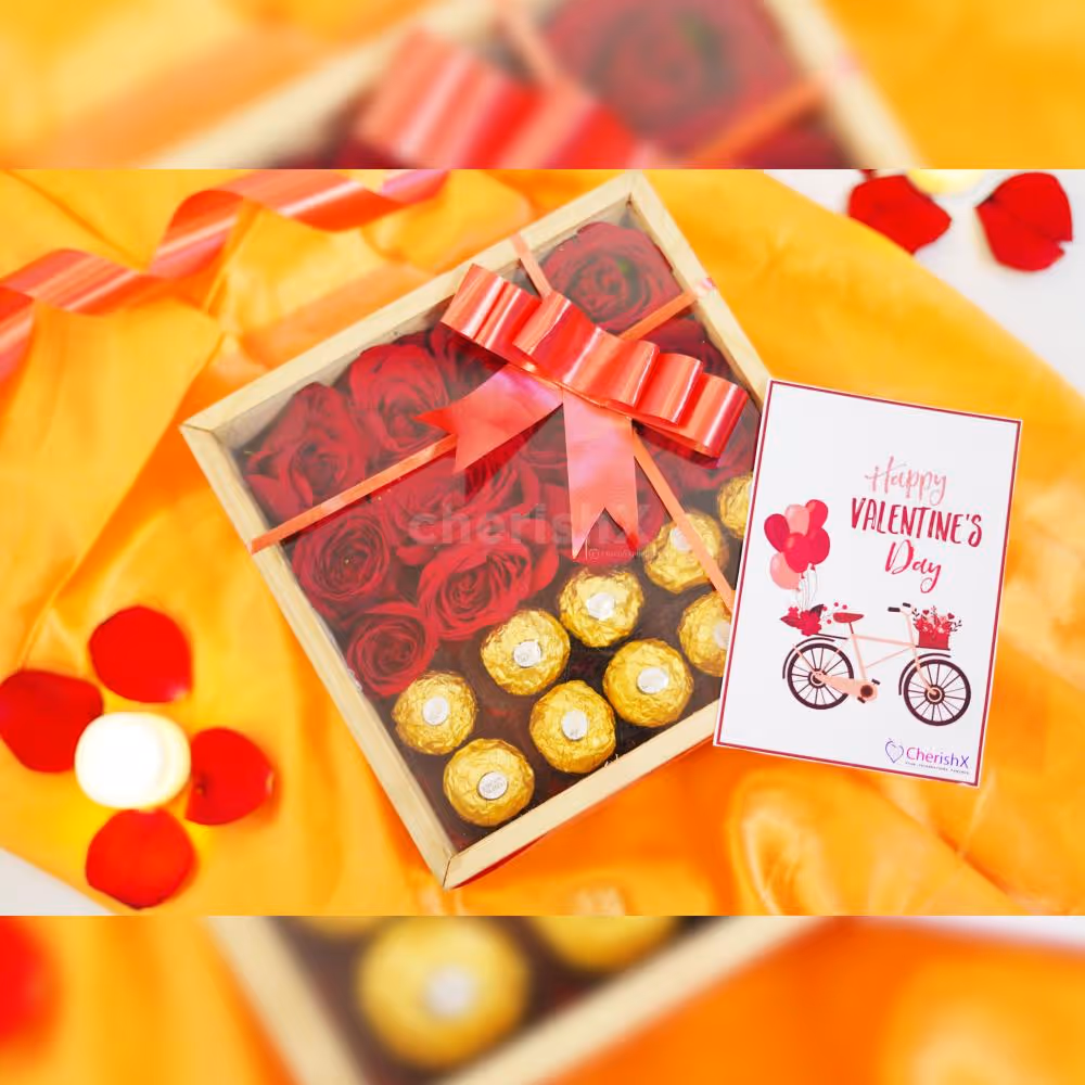 This Love hamper box has a clear box of fresh red roses
