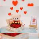 A wooden basket filled with 5 Ferrero Rocher chocolates, radiating sweetness and indulgence.