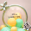 It's all about the pastel green and yellow balloons tied together