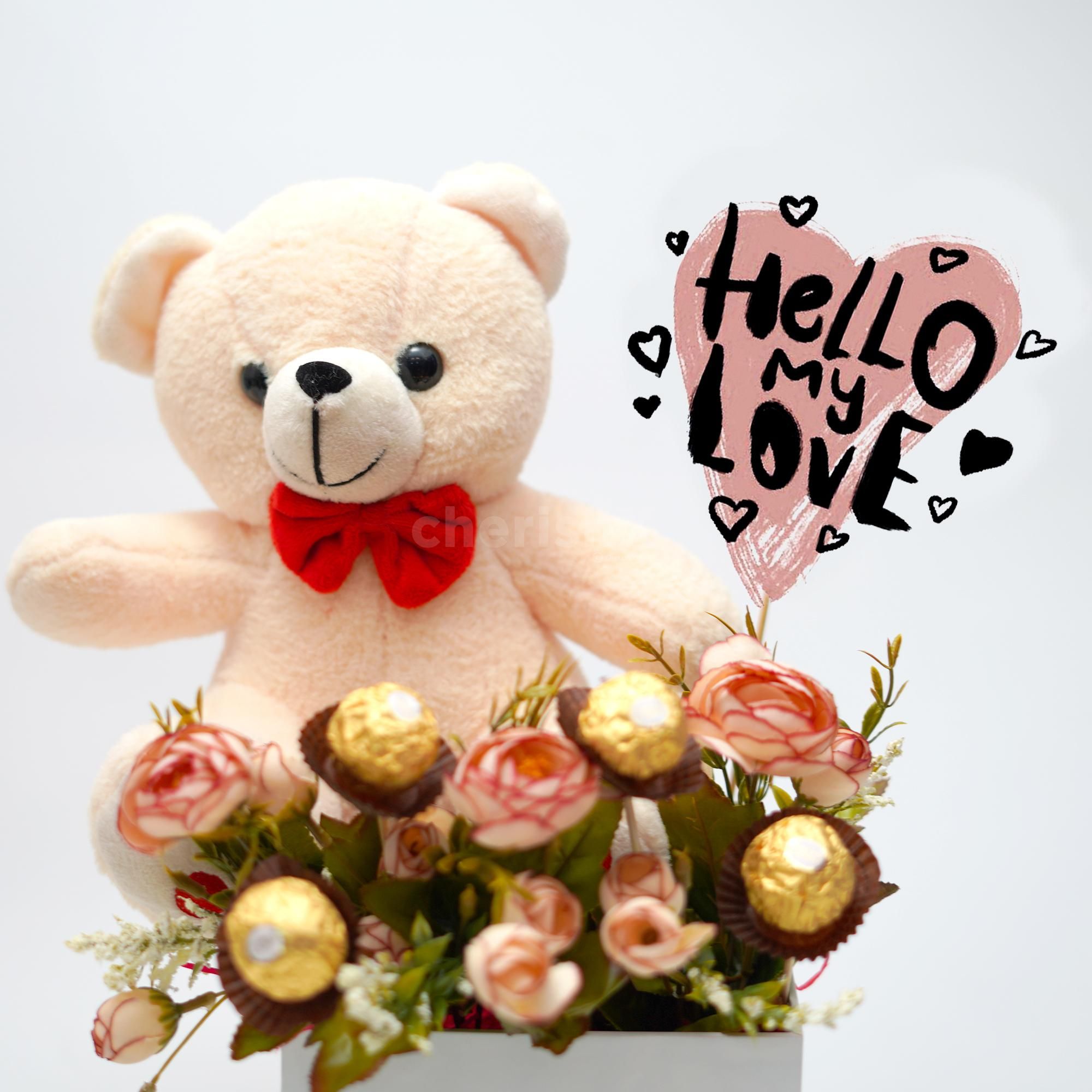 It comes in a white bucket with a standard message card.
