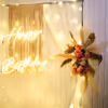 Enchanting Golden Hour Magic birthday decorations showcasing Pampass Sticks, White Leaves.