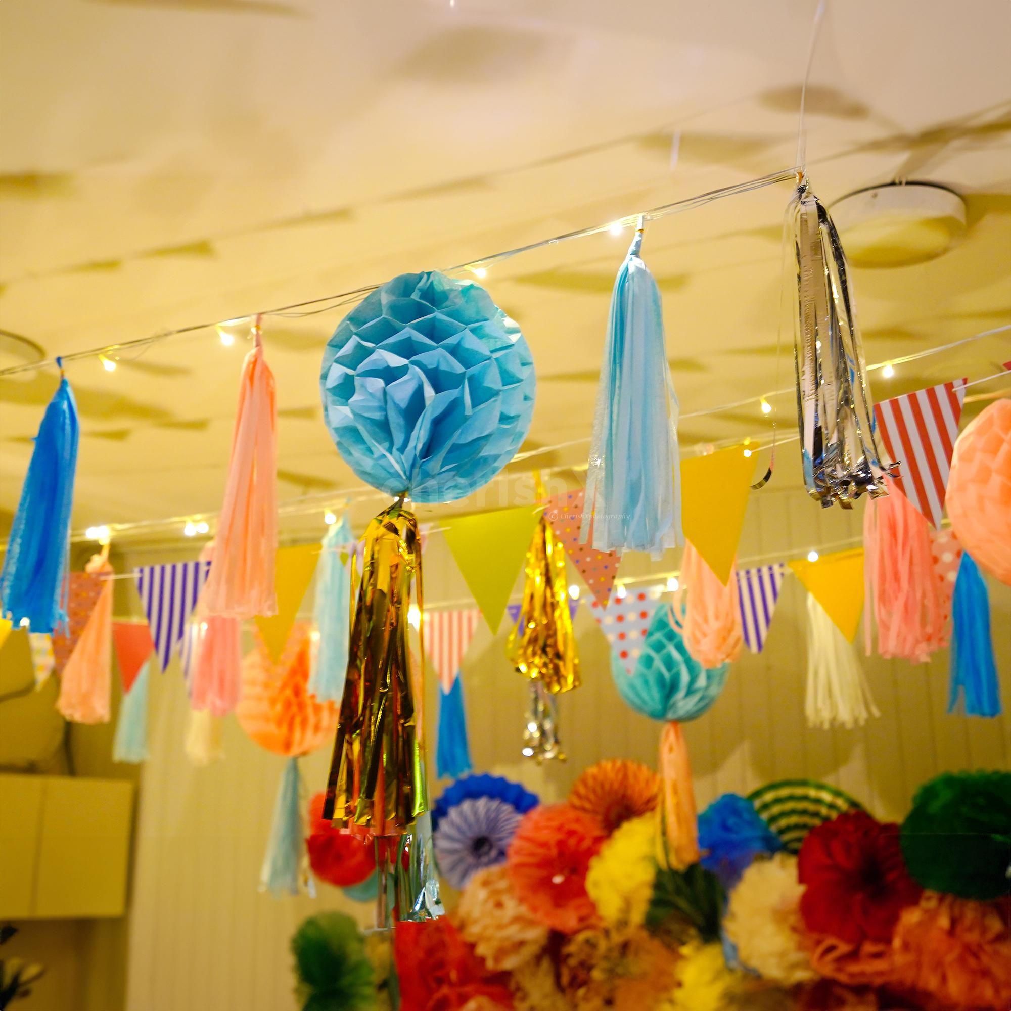 A collection of vibrant multicoloured tassels, ready for festive decorations.