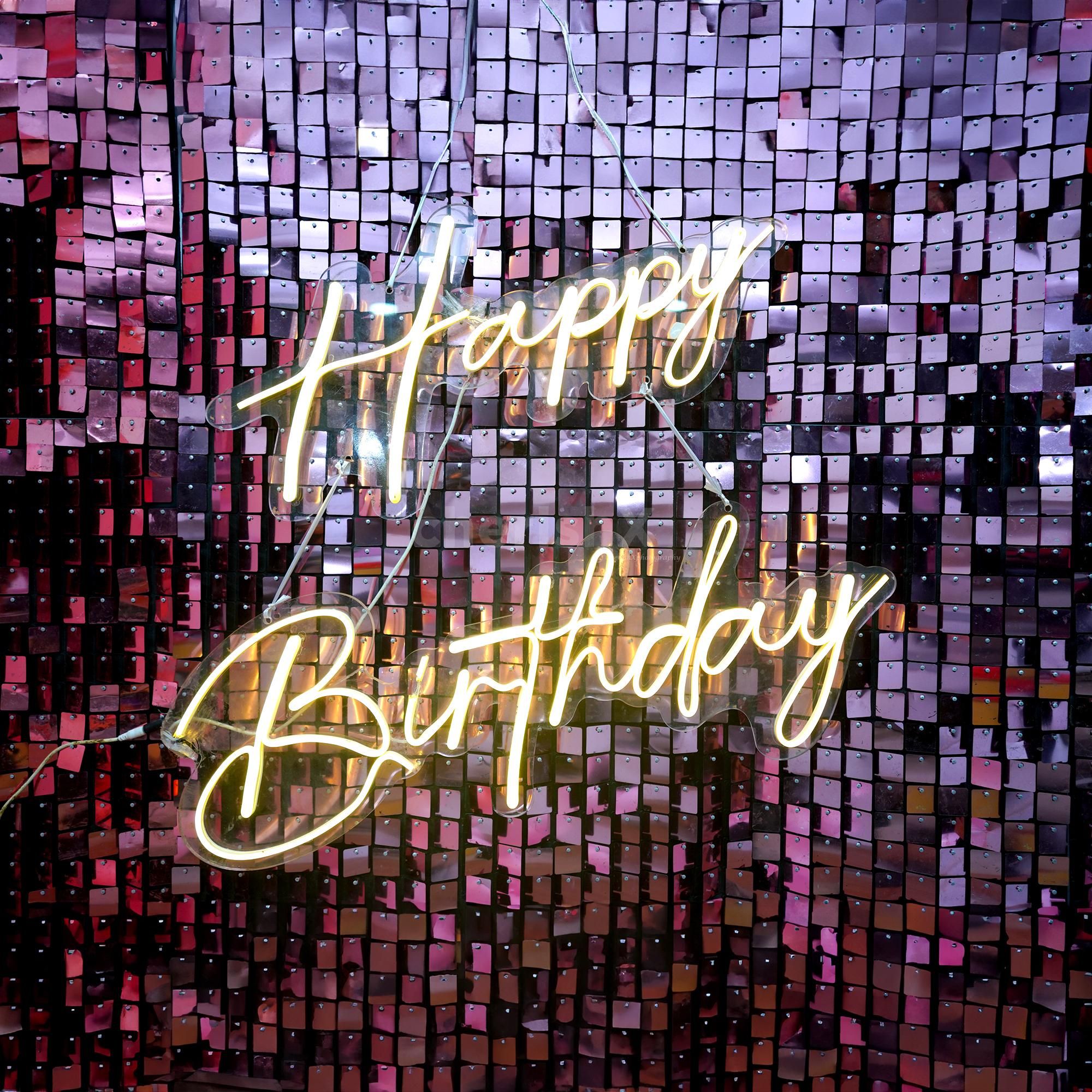 A Perfect neon light signage adds more charm to this pastel pink decoration with glamorous sequins.