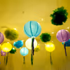 Purple, light blue, light green, and dark blue streamers, add a burst of colour to the decor.