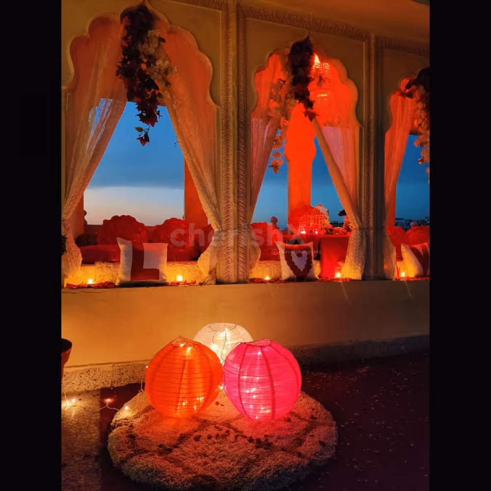 Step into an enchanting ambiance adorned with lacy curtains and fresh rose petals