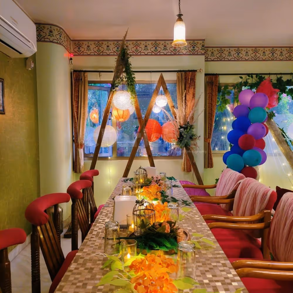 Savor gourmet delights surrounded by lush greenery at Peacock Garden