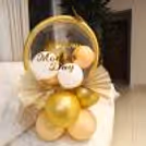Embrace Mom's Love: Golden Embrace Mother's Day Bouquet