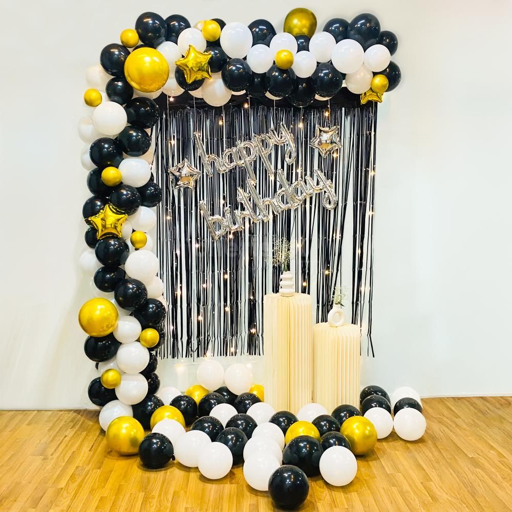 Celebrate in Style with Our Opulent Black and white Balloon Decor