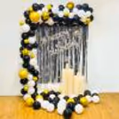Celebrate in Style with Our Opulent Black and white Balloon Decor