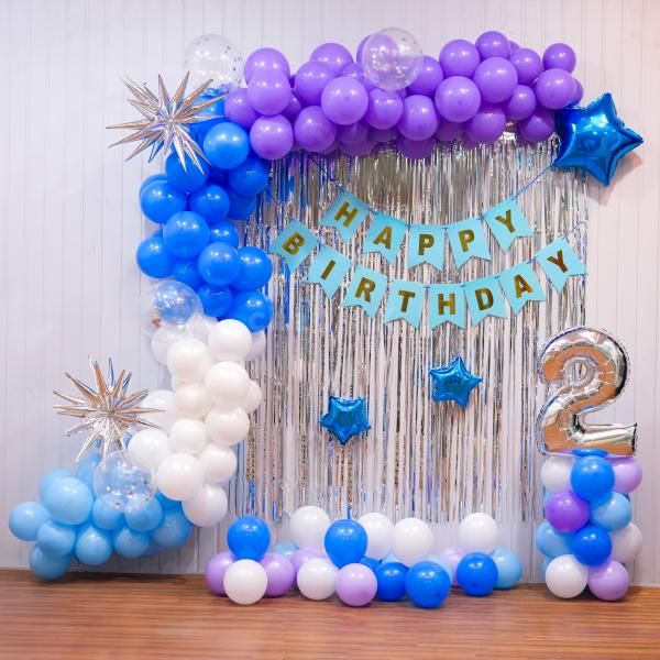 Celebrate in Style with Our Blue and Silver Balloon Decor