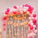 Add a Touch of Whimsy to Your Party with Pink and White Balloons