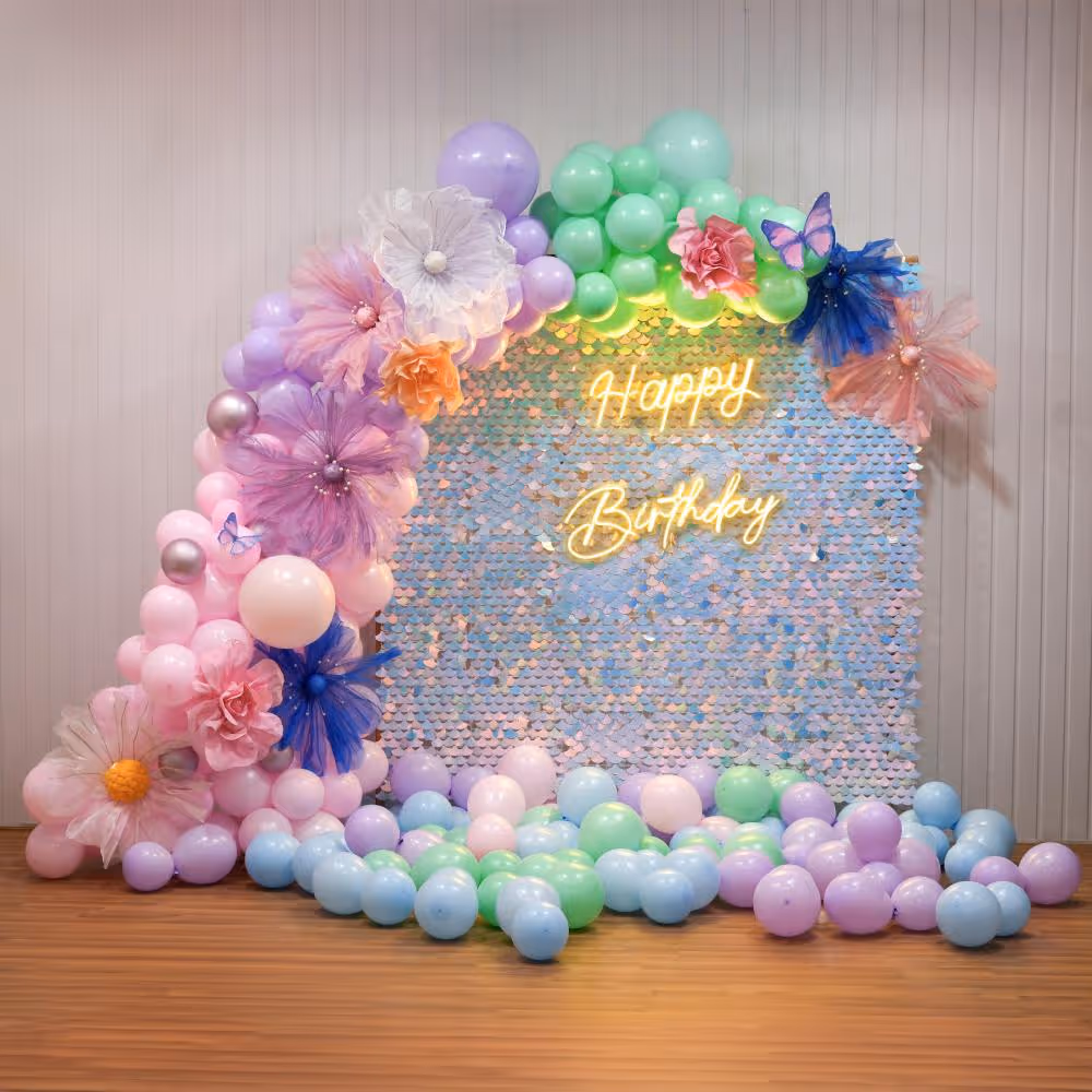 Bask in the elegance of premium flowers and pastel balloons