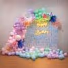 Bask in the elegance of premium flowers and pastel balloons