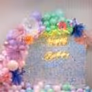 Capturing the essence of elegance with pastel balloons and blooms