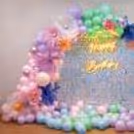 Celebrate your special day surrounded by the charm of pastel hues and exquisite flowers