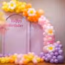 Capturing the essence of celebration with flowers and pastel balloons