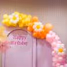 A fusion of floral elegance and balloon whimsy awaits