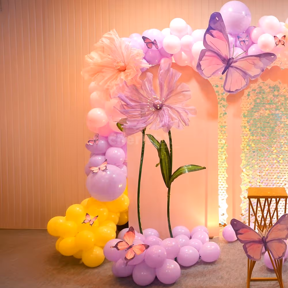 Elegance meets whimsy in a celebration adorned with flowers and butterflies
