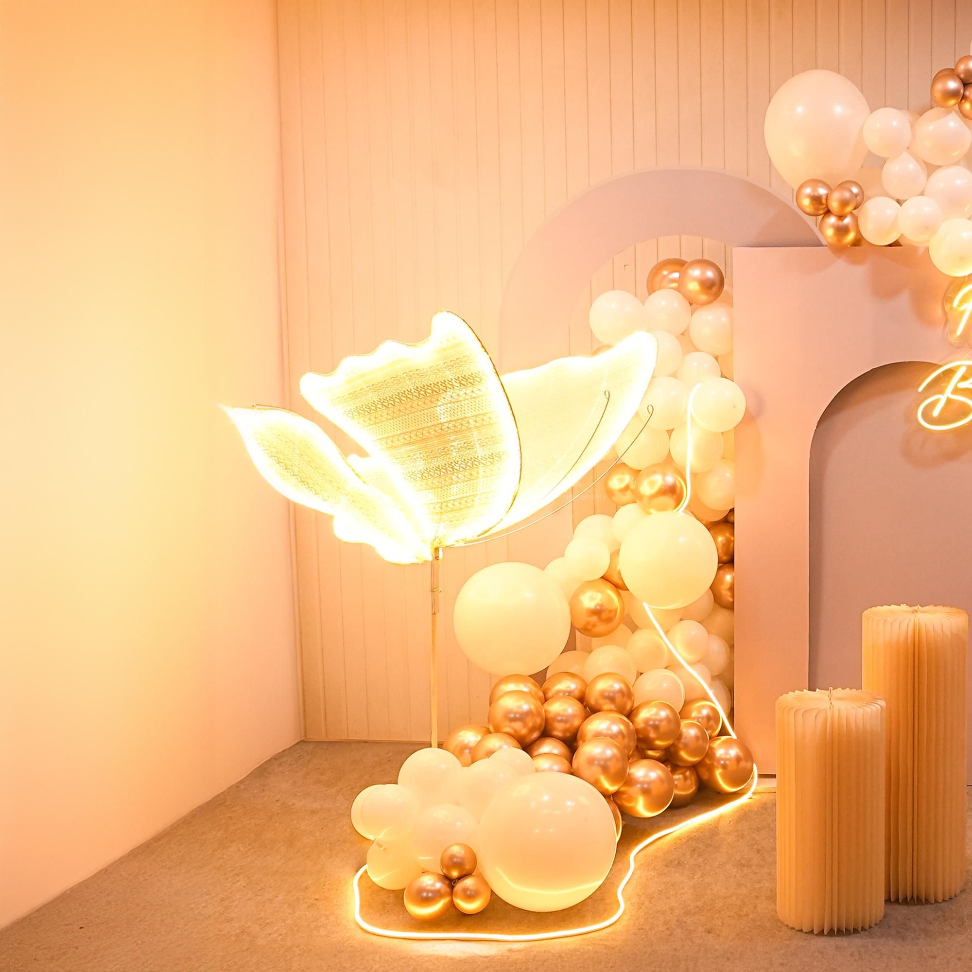 Every detail sparkles with joy in our butterfly and neon light decor