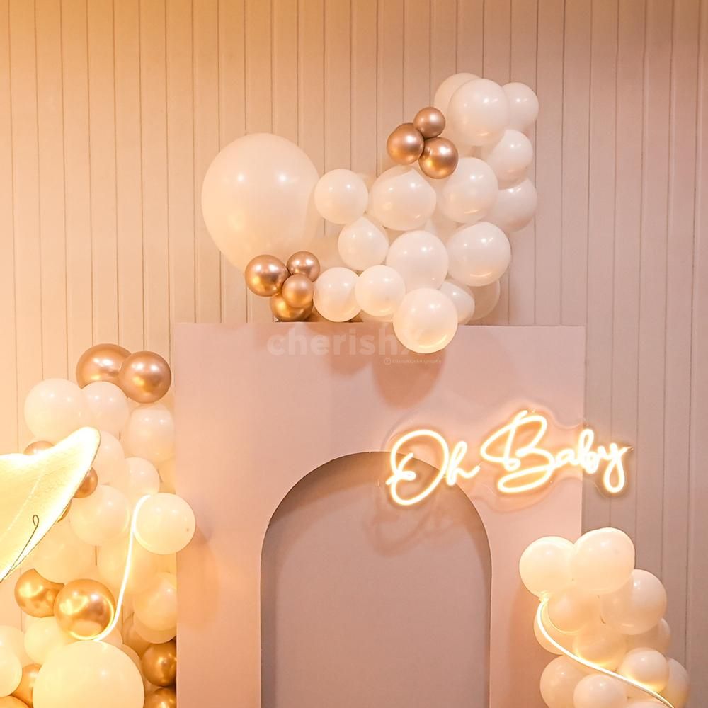 Illuminate your celebration with butterflies, balloons, and neon lights