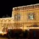 Elegant and charming fairy lights for a 20ft wide house frontage