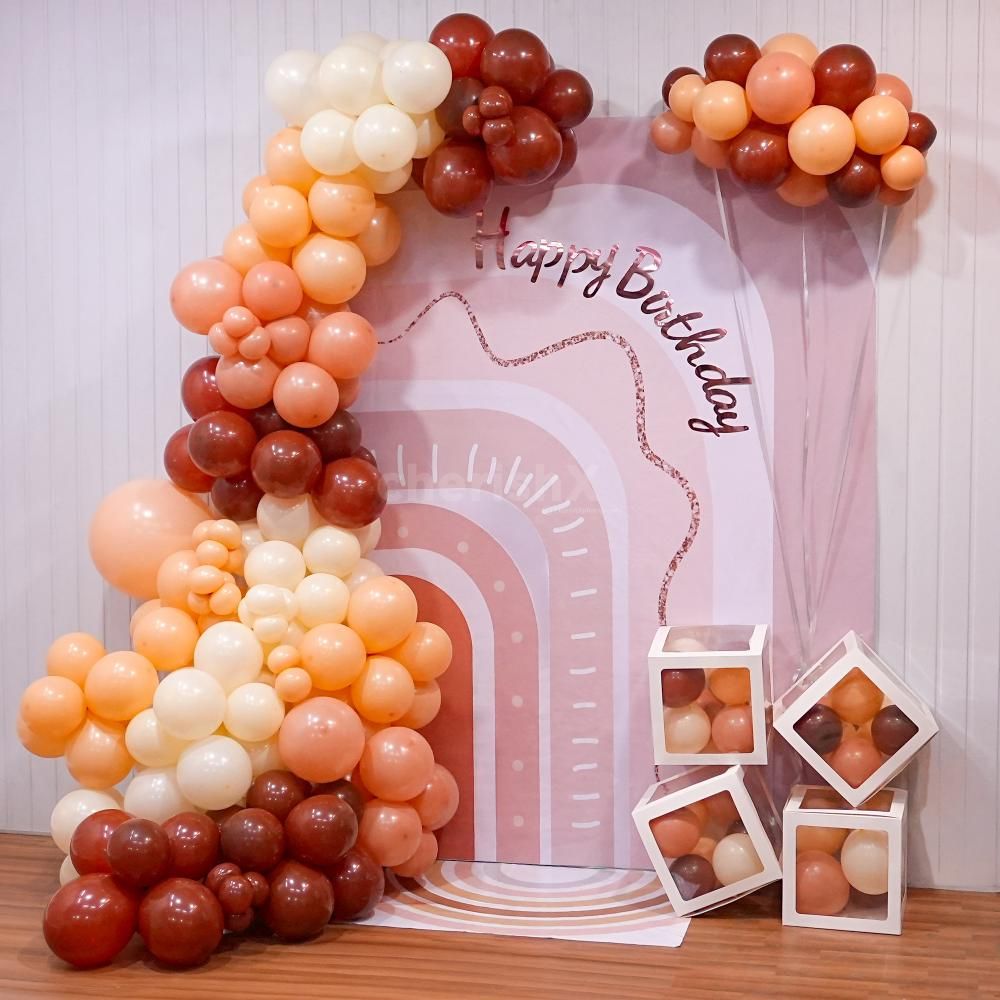 Embrace bohemian charm with our whimsical boho chic balloon decor