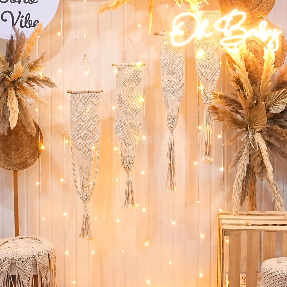 Step into a whimsical haven for your baby shower with our chic boho decor