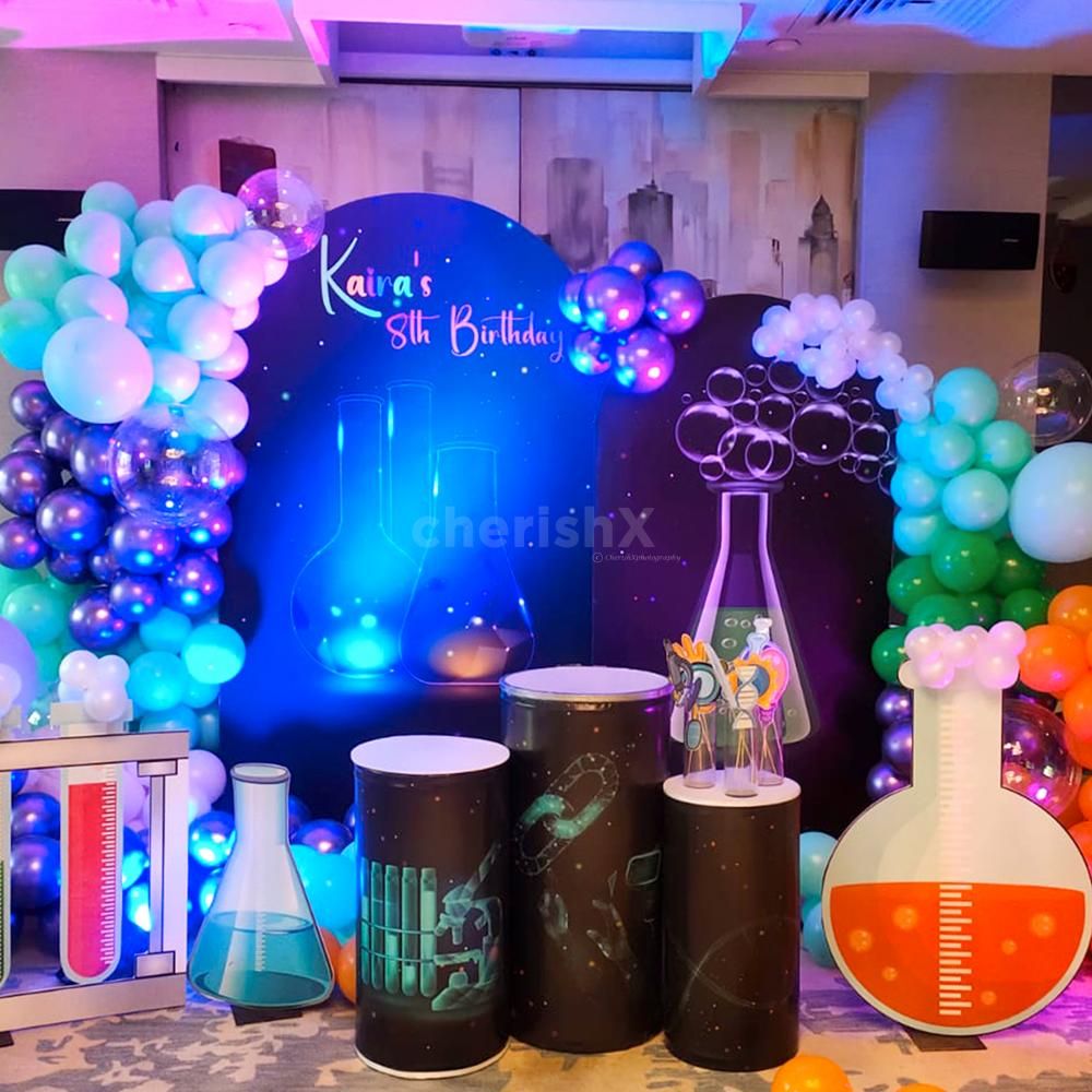 Creating unforgettable memories with our colorful science-themed birthday celebration.