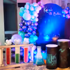 Elevate your celebration with the charm of scientific decorations and vibrant balloons.