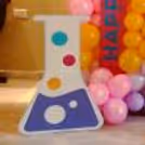 A whimsical exploration of discovery and delight at our science-themed celebration.