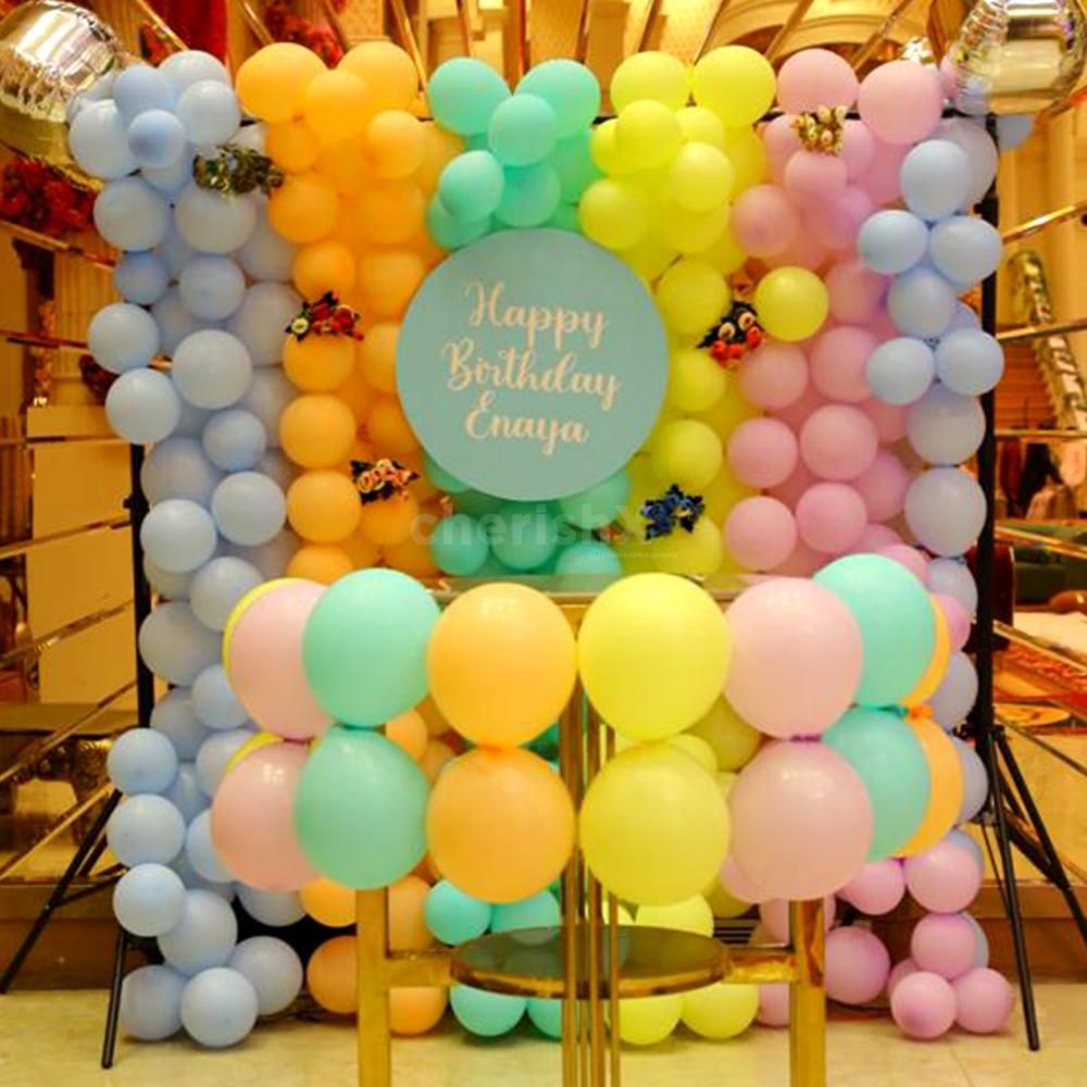 Birthday magic comes alive with our colorful balloon backdrop!