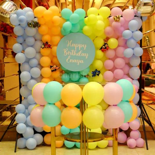 Birthday magic comes alive with our colorful balloon backdrop!