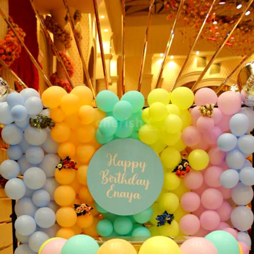 A picture-perfect birthday scene with our stunning balloon wall.