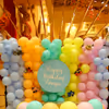A picture-perfect birthday scene with our stunning balloon wall.