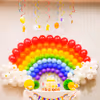 Whimsical rainbow swirls and characters for a magical ceiling decoration