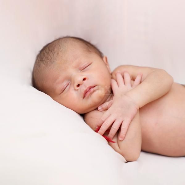 Mommy’s Love: A timeless shot of mother and baby in a coordinated gown and theme.