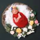 Mommy’s Love: A timeless shot of mother and baby in a coordinated gown and theme.