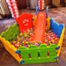 Fun birthday party ball pool with slider, creating an exciting play area for kids' celebrations.