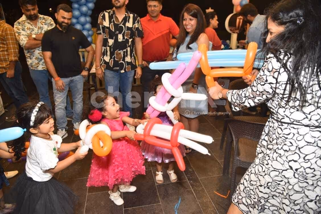 Balloon artist making magic at the kids' birthday party
