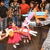 Balloon artist making magic at the kids' birthday party