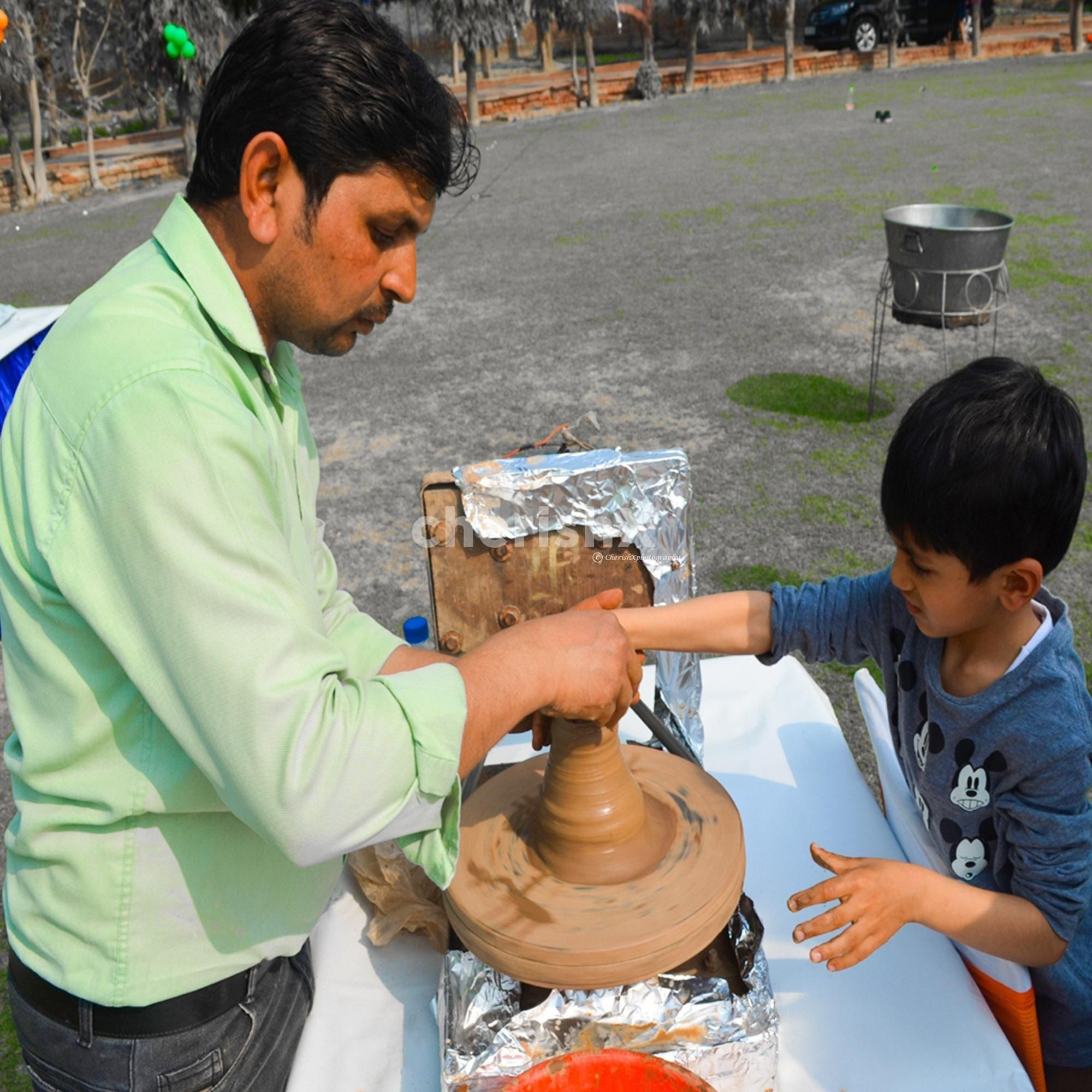Celebrating creativity with a pottery activity at the kids' birthday party